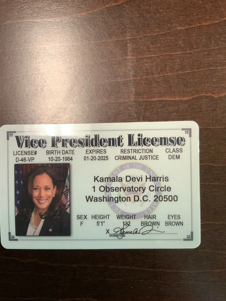 Biden & Harris driver’s license page with black text, Washington D.C. 20500, and gold U.S. flag on top.